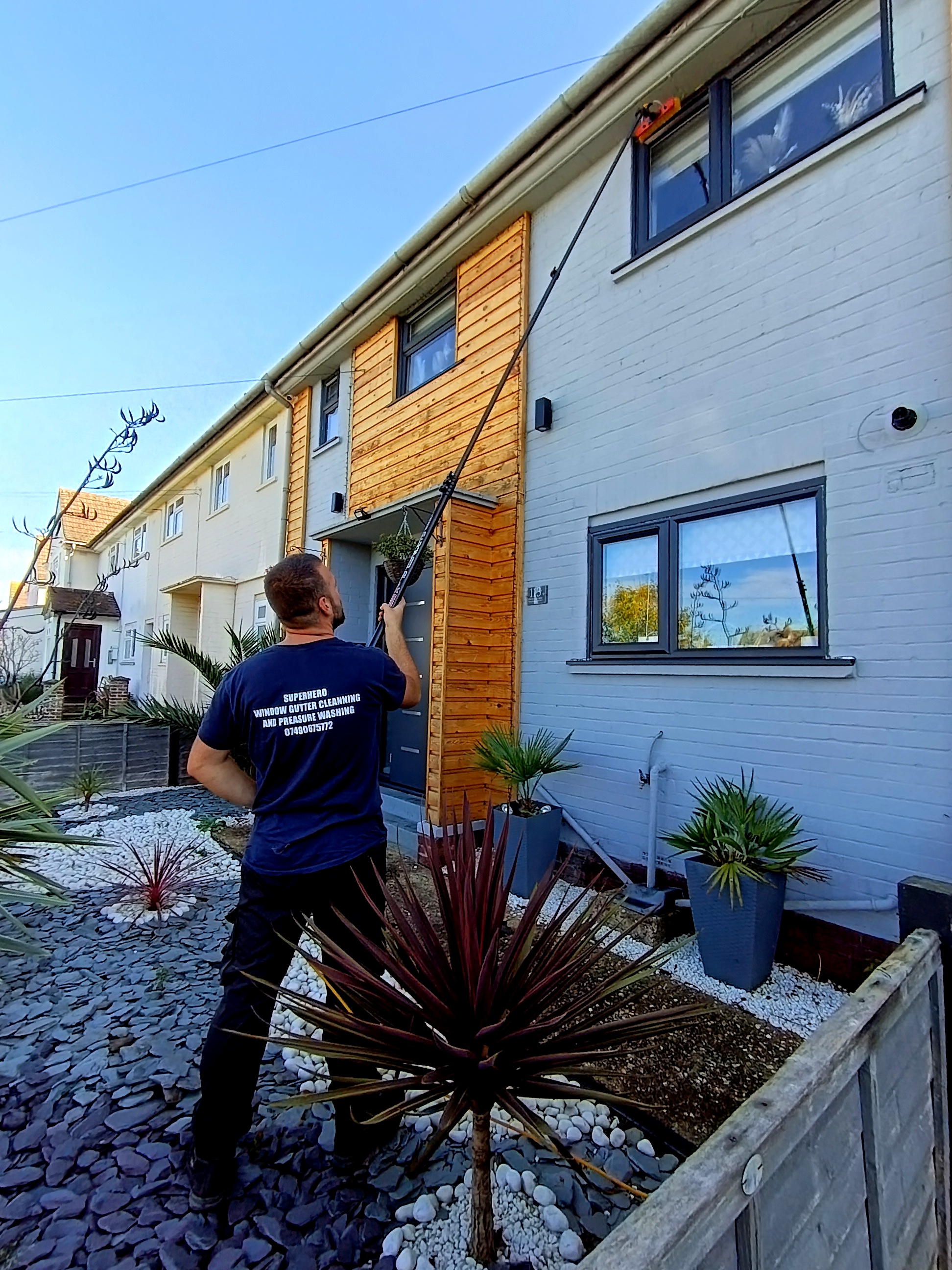 Superhero window cleaning & gutter cleaning and pressure washing work photo 1