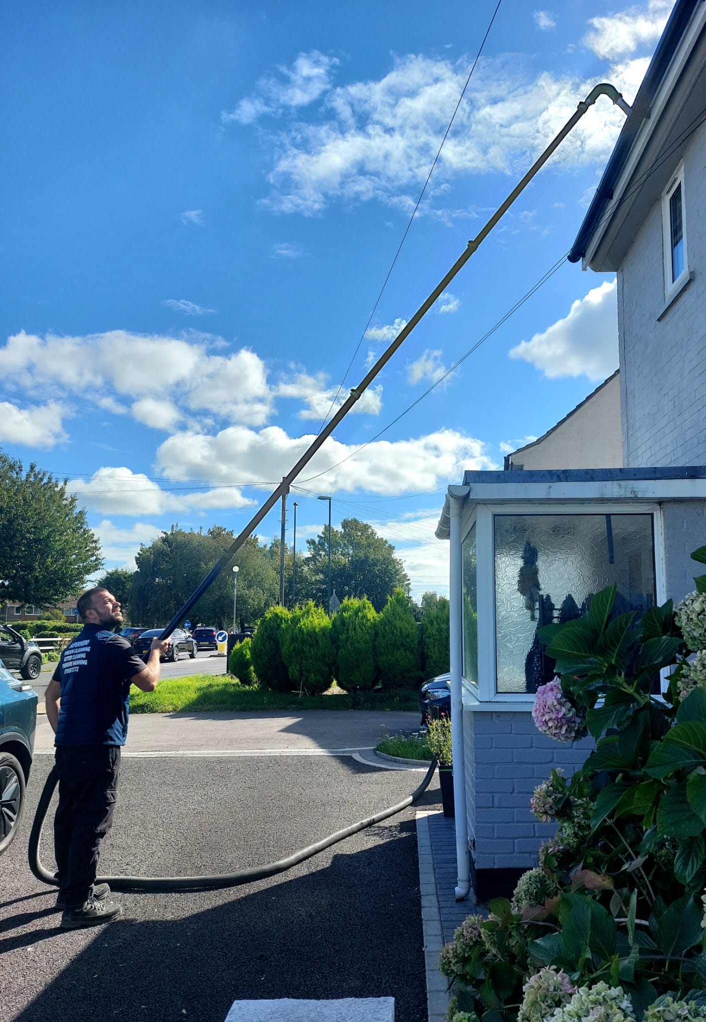 Superhero window cleaning & gutter cleaning and pressure washing work photo 7